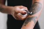 erasing your tattoo, tattoo, 7 frequently asked questions about erasing your tattoo answered, Tattoo