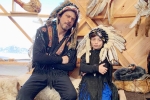 shahrukh khan biography, shah rukh khan age, shah rukh khan and his son abram trolled for sporting native american war bonnets, Abram