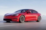 Tesla, Tesla new electric car pictures, tesla to launch electric hatchback without a steering wheel, Tesla car without steering