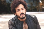 Nagarjuna and Akhil breaking news, Nagarjuna and Akhil, nagarjuna s 100th film will have akhil in a crucial role, Bangarraju